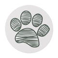 Circular object with a green paw print design on a white background